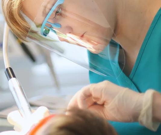 Patient being checked by dentist